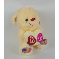 Ведмідь із серцем муз 077439 25см